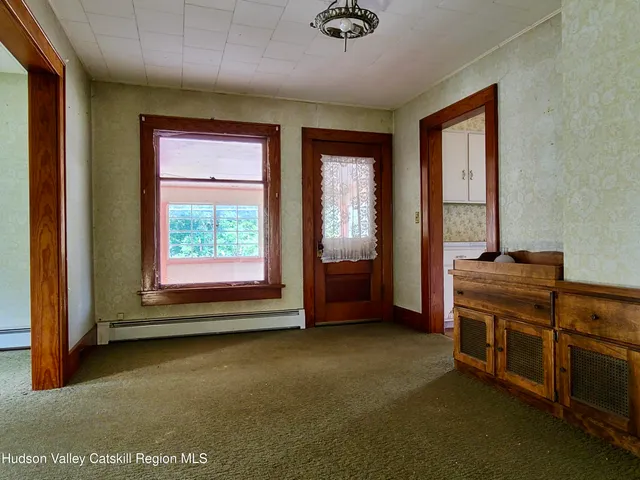 an empty room with an entryway