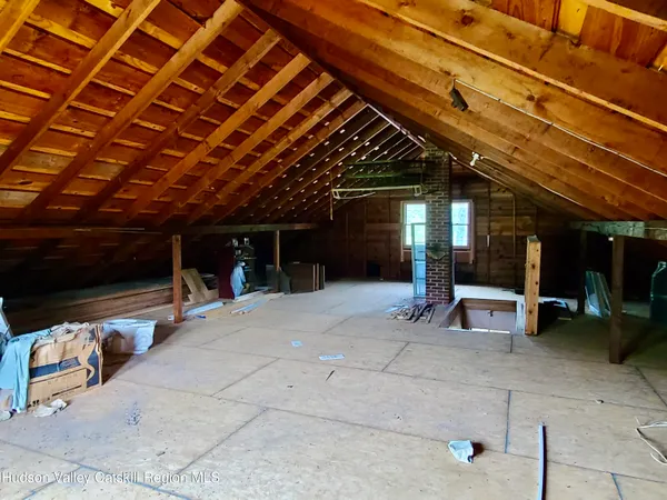 a view of a house with a yard porch and sitting area