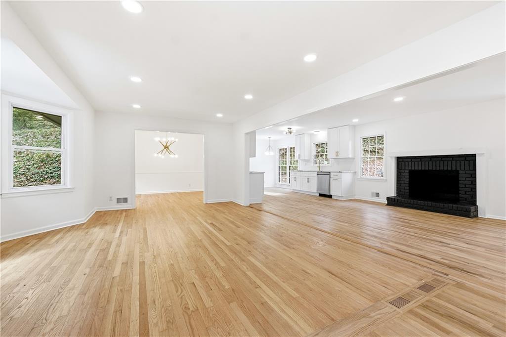 2520 Overlook Way Northeast Atlanta, GA 30345 - Photo 11 of 31 an empty room with wooden floor and a window