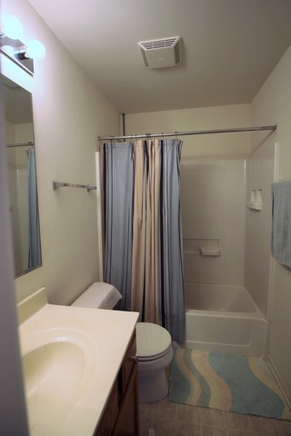 3082 Patterson Road Montgomery, IL 60538 - Photo 23 of 25 a bathroom with a sink a toilet and shower