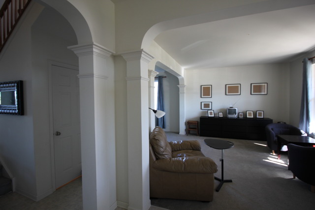 3082 Patterson Road Montgomery, IL 60538 - Photo 4 of 25 a living room with furniture and a couch