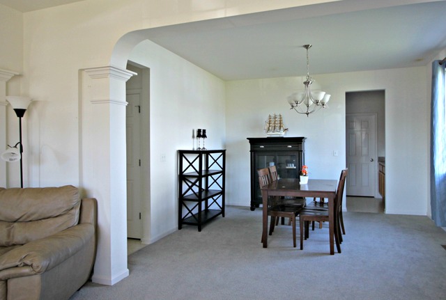 3082 Patterson Road Montgomery, IL 60538 - Photo 5 of 25 a view of a livingroom with furniture and chandelier kitchen