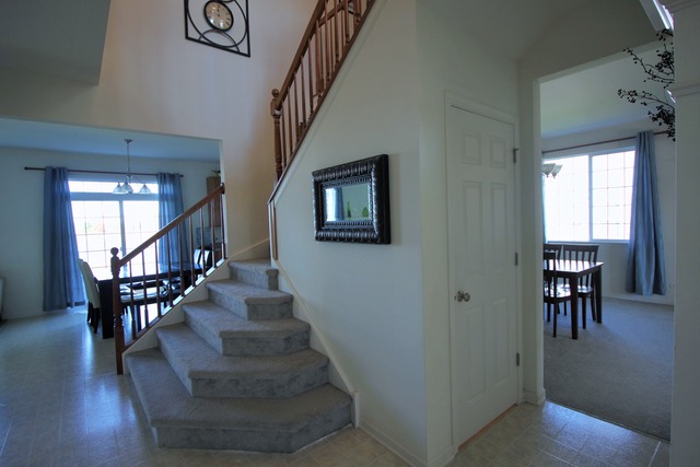 3082 Patterson Road Montgomery, IL 60538 - Photo 6 of 25 a view of entryway and hall with wooden floor