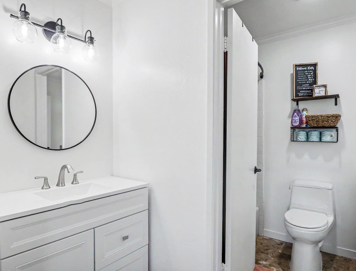 1310 Primavera Street, Unit 109 Salinas, CA 93901 - Photo 19 of 37 a bathroom with a toilet and a sink