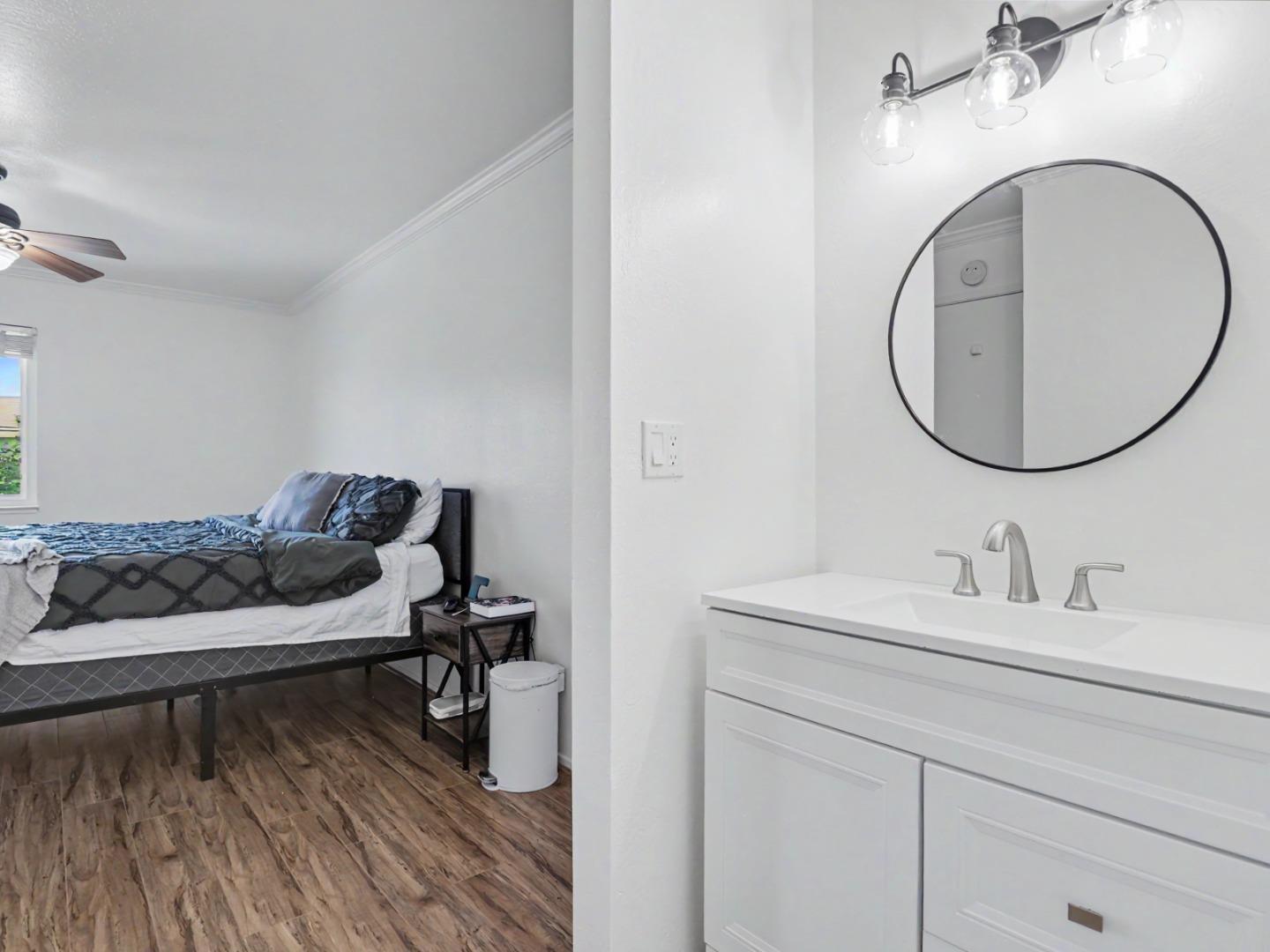 1310 Primavera Street, Unit 109 Salinas, CA 93901 - Photo 20 of 37 a bathroom with a sink and a mirror