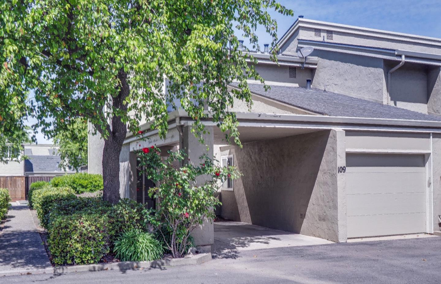 1310 Primavera Street, Unit 109 Salinas, CA 93901 - Photo 2 of 37 a view of a house with a tree