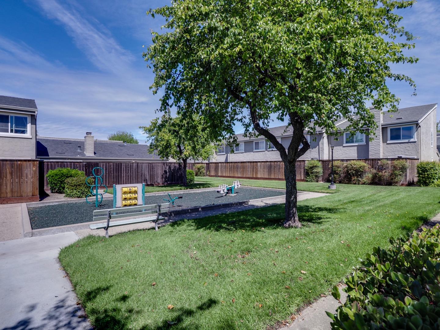 1310 Primavera Street, Unit 109 Salinas, CA 93901 - Photo 27 of 37 a garden view with a seating space