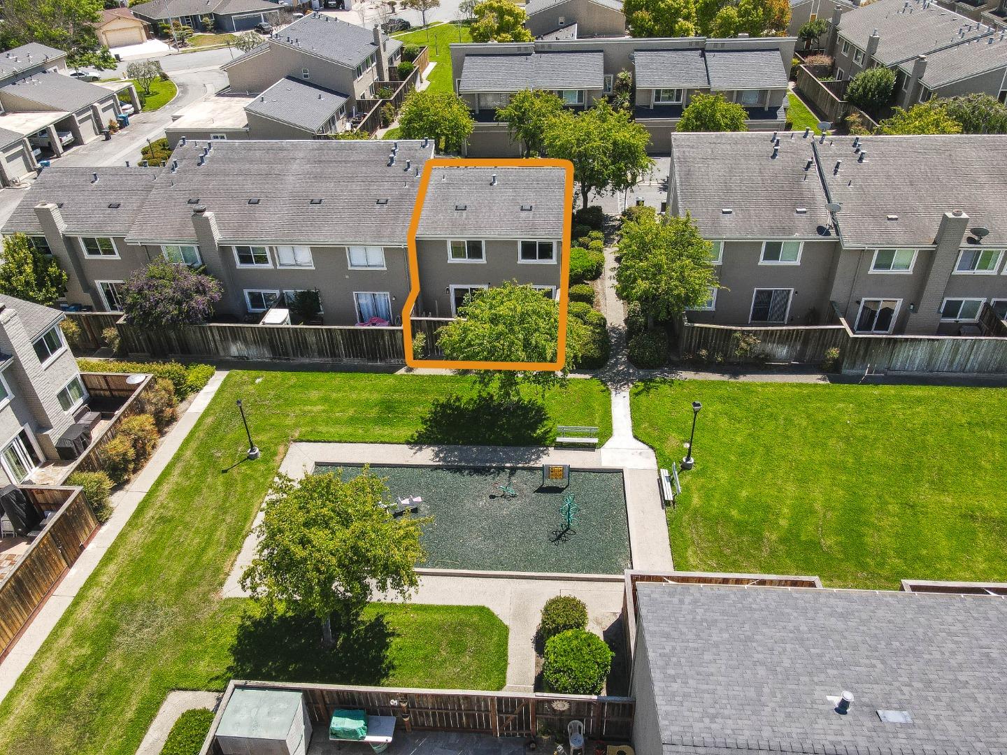 1310 Primavera Street, Unit 109 Salinas, CA 93901 - Photo 30 of 37 an aerial view of a house with swimming pool and outdoor seating