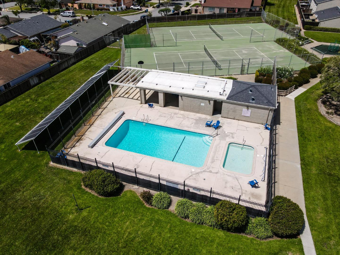 1310 Primavera Street, Unit 109 Salinas, CA 93901 - Photo 34 of 37 an aerial view of a house with a garden and lake view