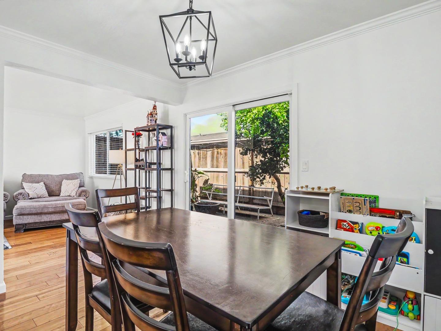 1310 Primavera Street, Unit 109 Salinas, CA 93901 - Photo 9 of 37 a dining room with furniture and window