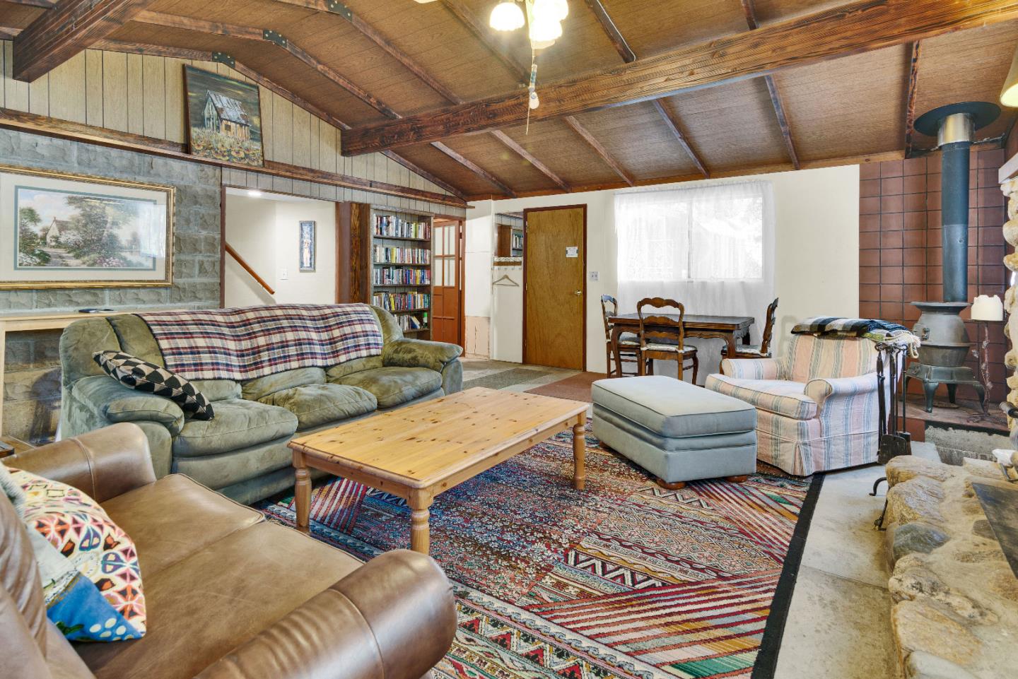 47527 Arroyo Seco Road, Unit 41 Greenfield, CA 93927 - Photo 14 of 22 a living room with furniture and a chandelier