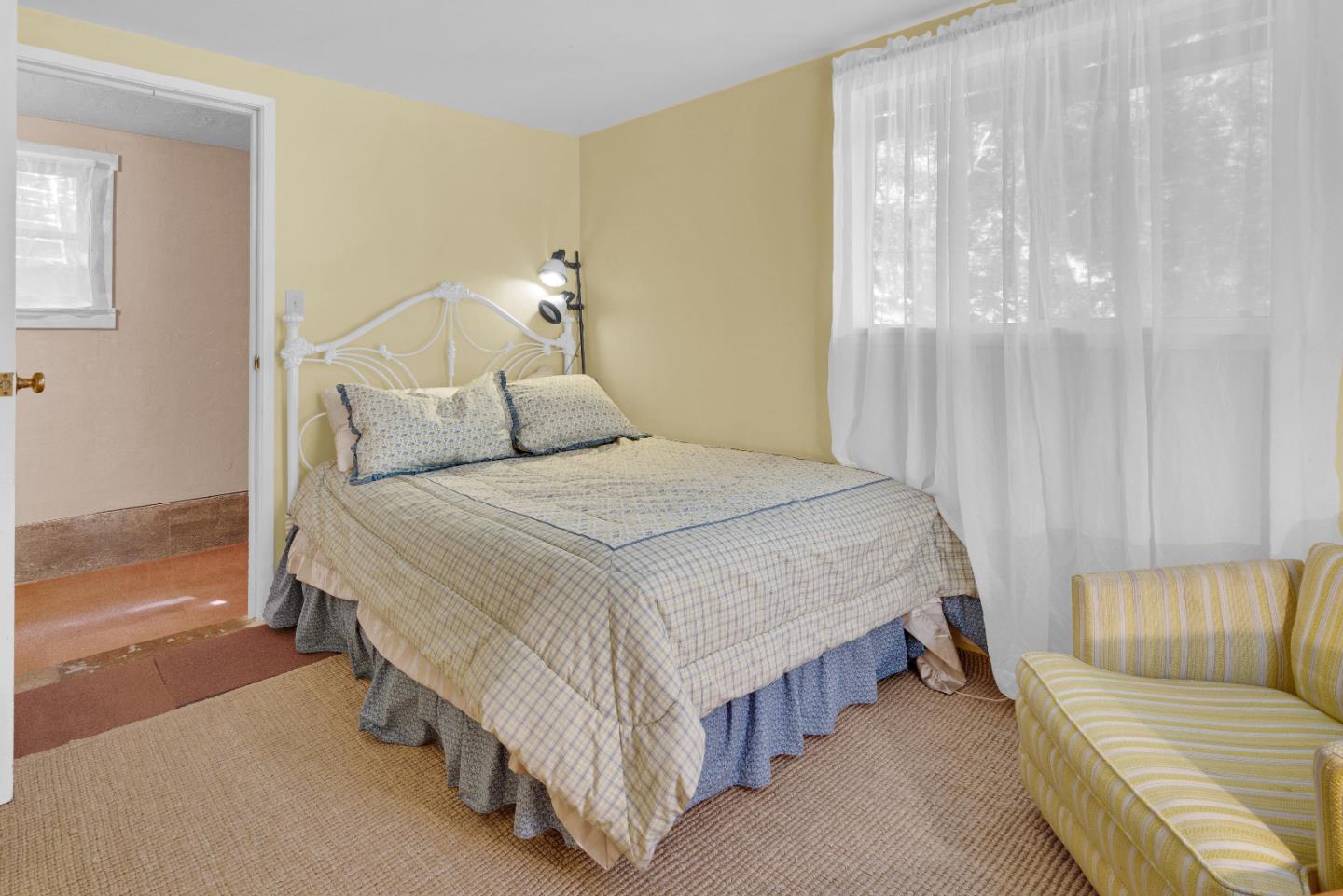 47527 Arroyo Seco Road, Unit 41 Greenfield, CA 93927 - Photo 19 of 22 a bedroom with a bed and a couch