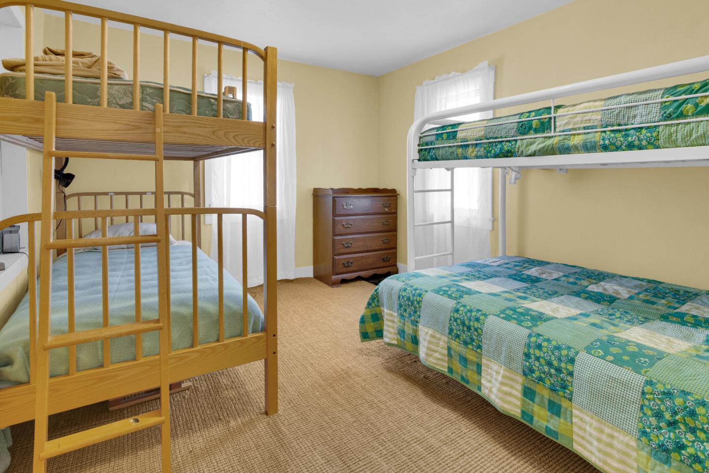 47527 Arroyo Seco Road, Unit 41 Greenfield, CA 93927 - Photo 20 of 22 a bedroom with a bed and a window