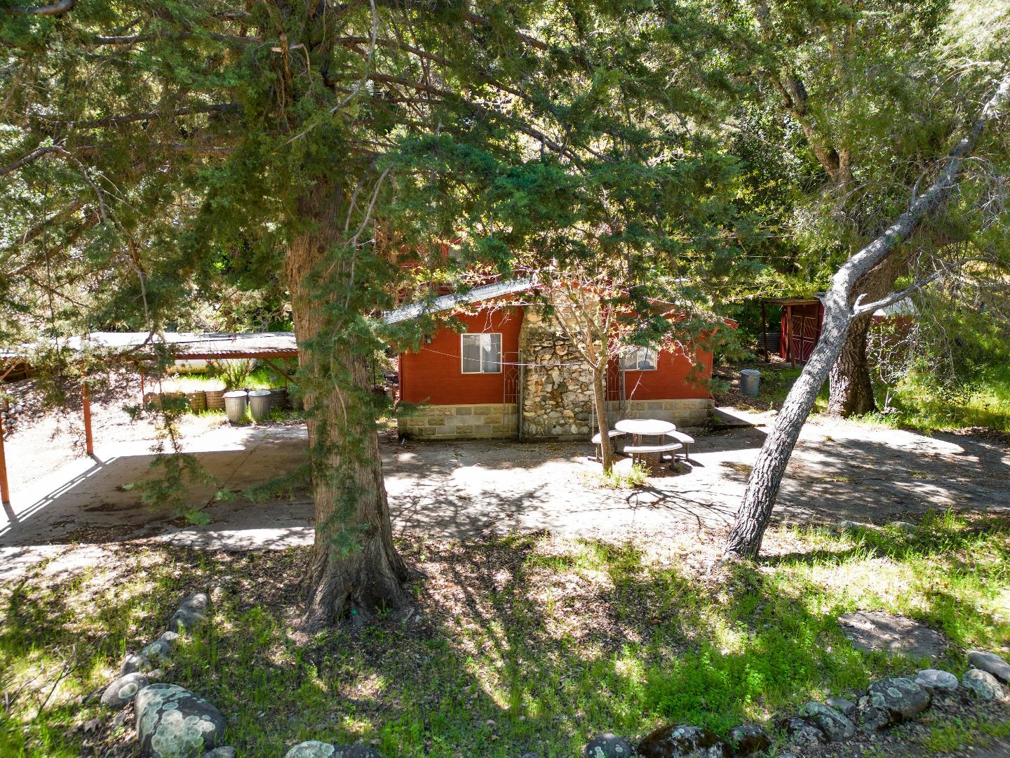 47527 Arroyo Seco Road, Unit 41 Greenfield, CA 93927 - Photo 2 of 22 a backyard of a house with table and chairs