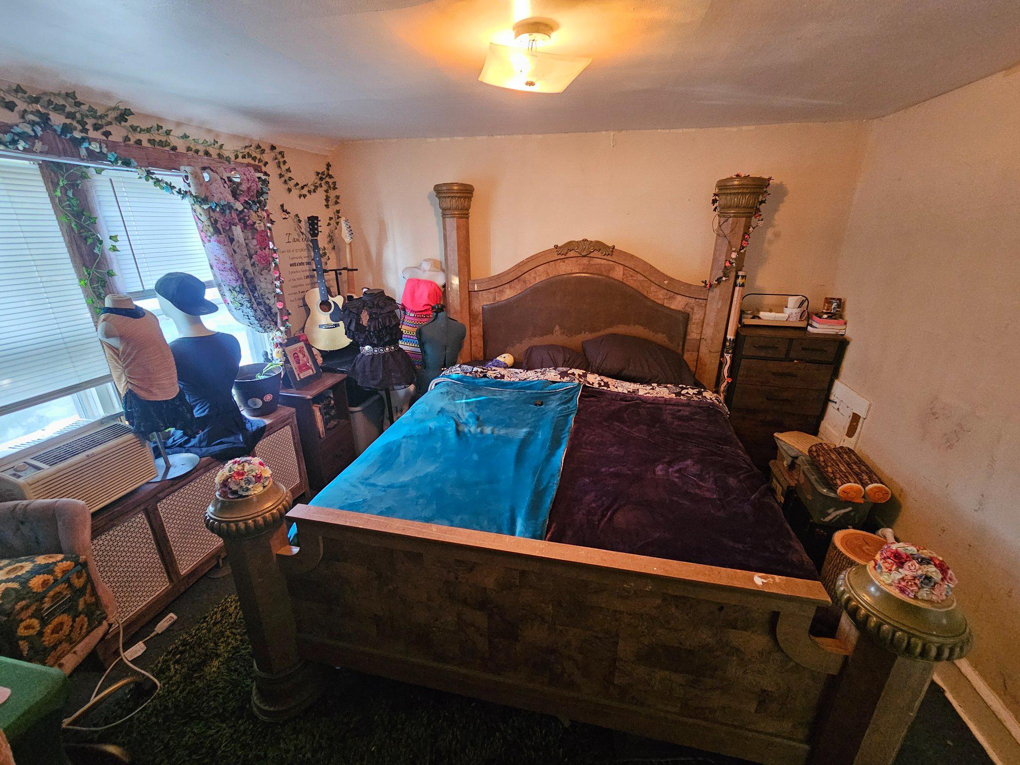 6913 Rodney Street Philadelphia, PA 19138 - Photo 11 of 17 a bed room with a bed and a chair