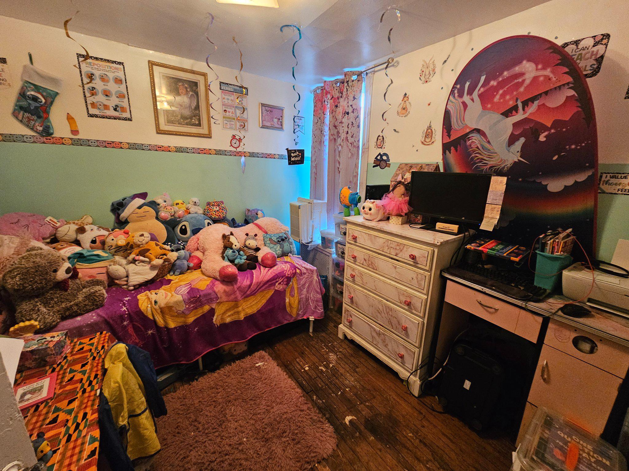 6913 Rodney Street Philadelphia, PA 19138 - Photo 12 of 17 a bedroom with a bed and furniture