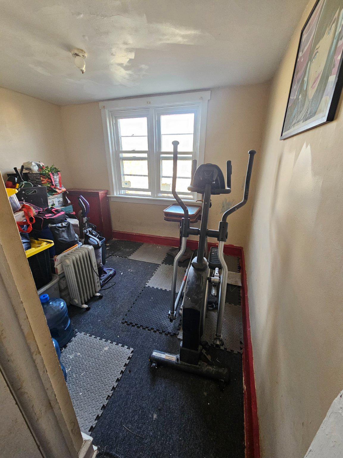 6913 Rodney Street Philadelphia, PA 19138 - Photo 14 of 17 a room with lots of gym equipment