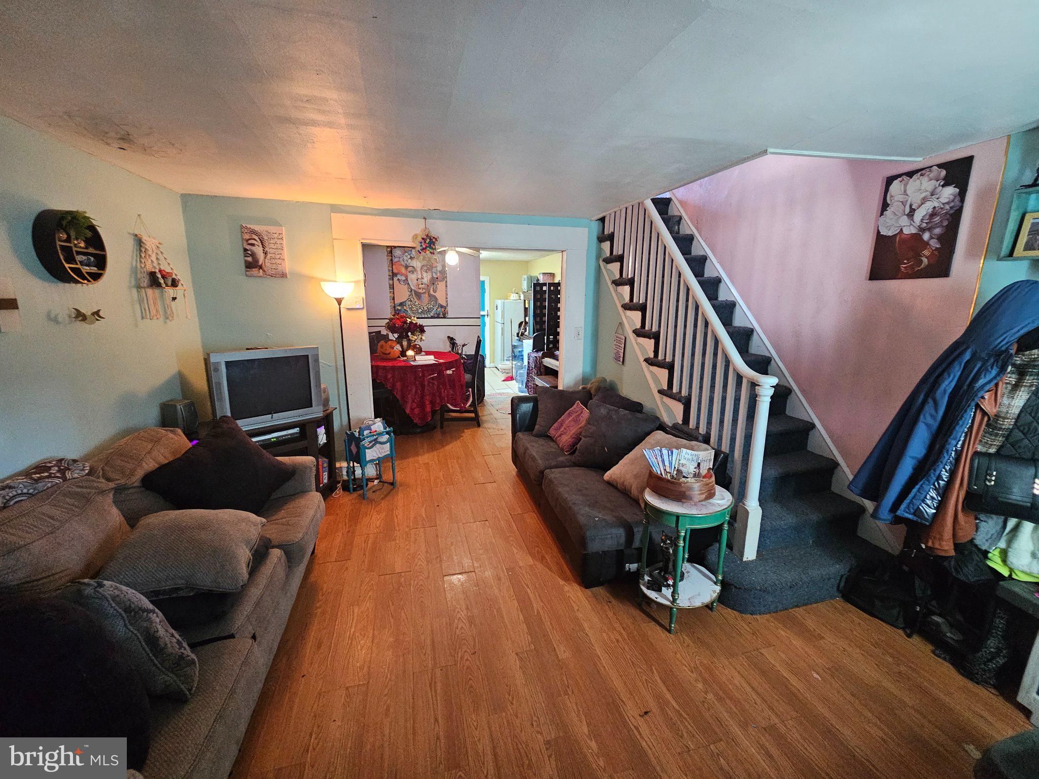 6913 Rodney Street Philadelphia, PA 19138 - Photo 2 of 17 a living room with furniture and a wooden floor