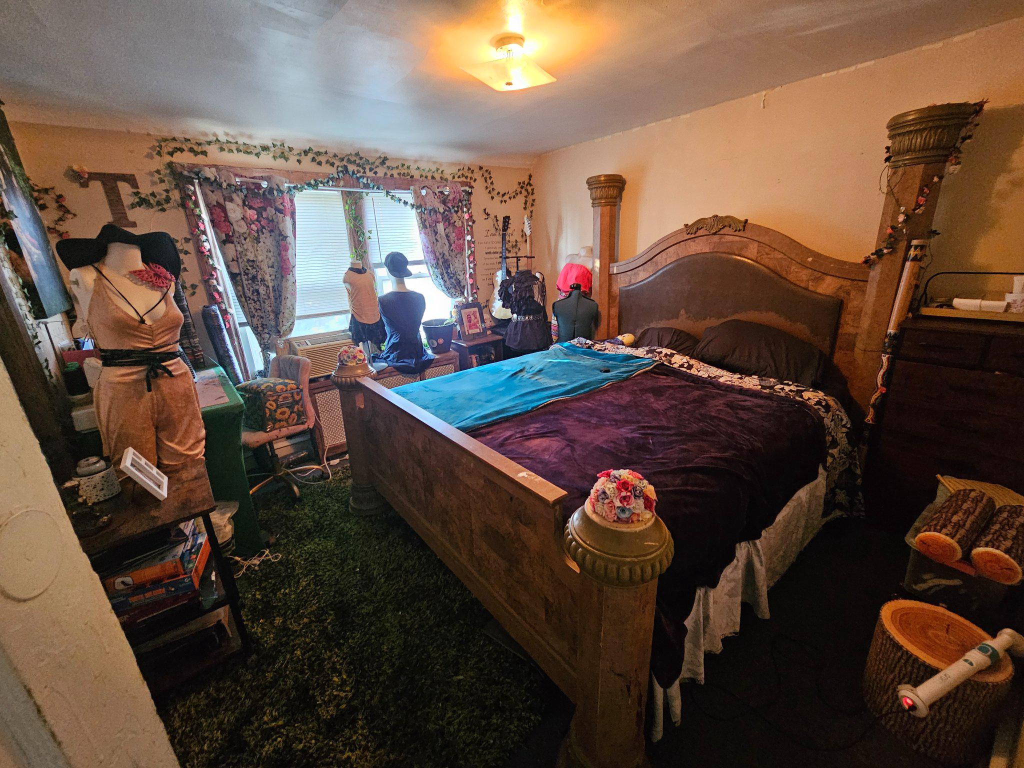 6913 Rodney Street Philadelphia, PA 19138 - Photo 10 of 17 a bed sitting in a bedroom next to a window