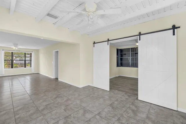 an empty room with windows