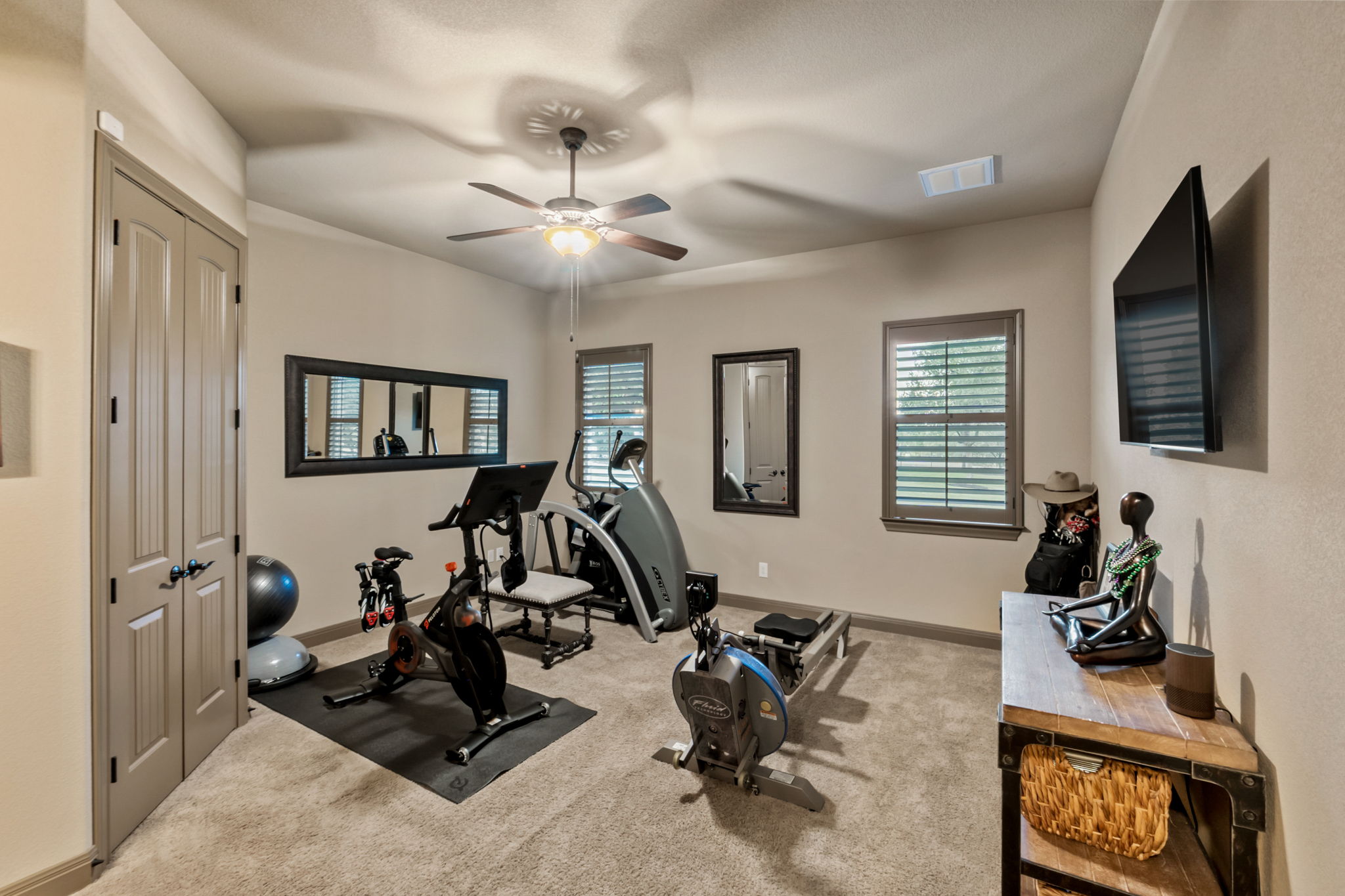 104 Vista Lane Georgetown, TX 78633 - Photo 20 of 36 Bedroom number three is being used as an Exercise room. It conveniently connects to the Jack & Jill bathroom.