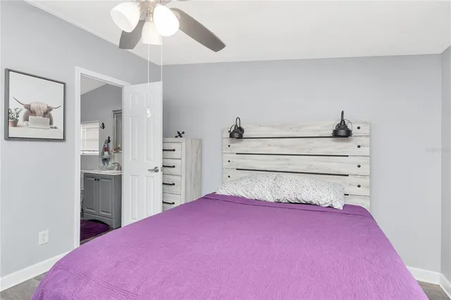 a bedroom with a bed and a closet