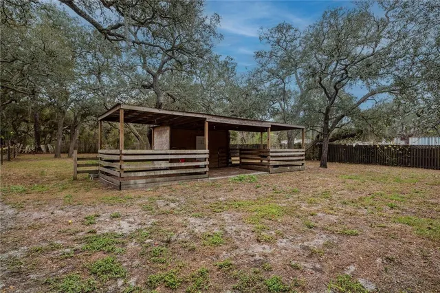 a view of a room with stairs and a large window