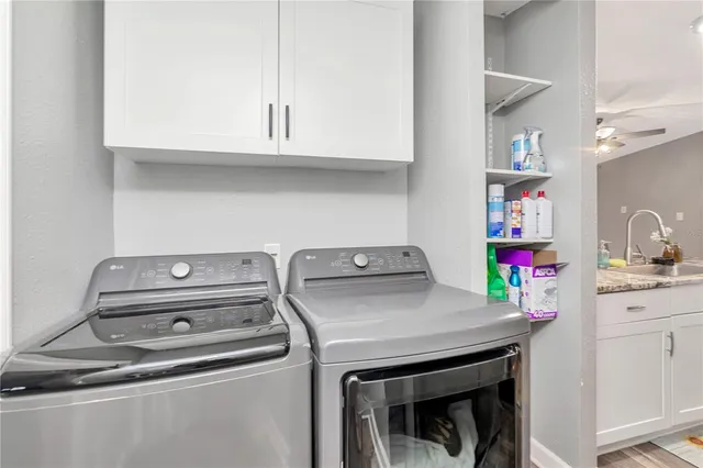 a utility room with dryer and washer