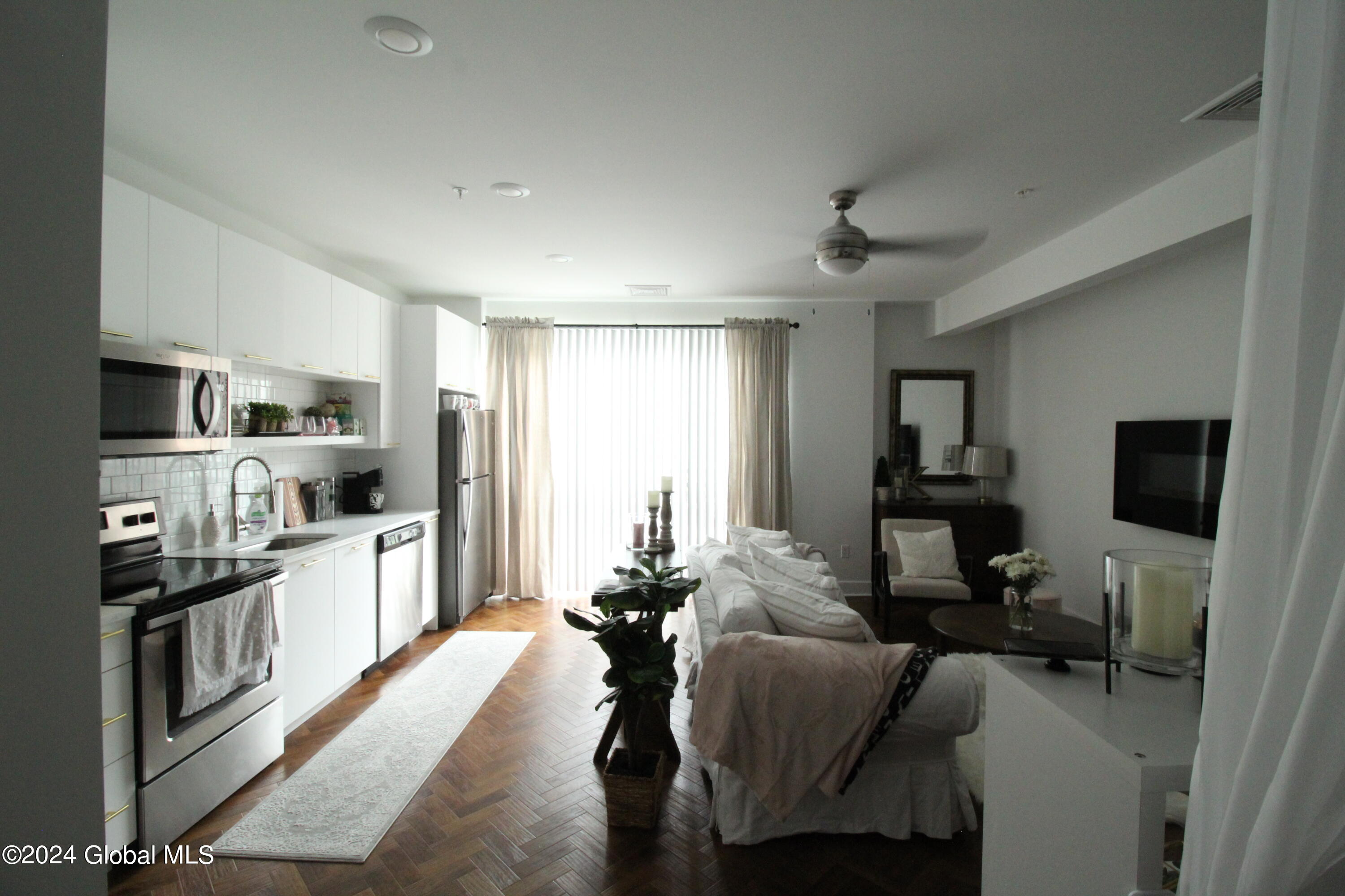 308 Excelsior Avenue, Unit 201 Saratoga Springs, NY 12866 - Photo 3 of 9 IMG_2561