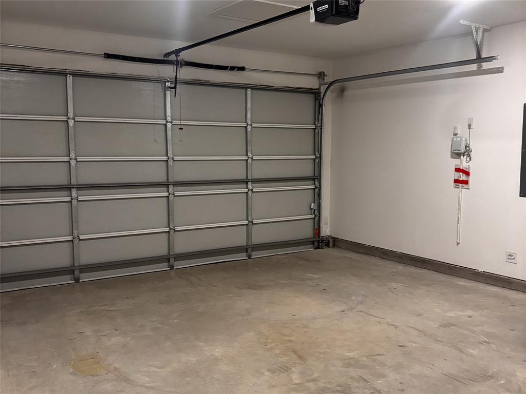 2828 Walden Road Celina, TX 75009 - Photo 27 of 30 Interior garage space with a concrete floor