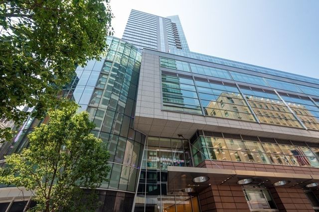 a living room with fireplace furniture and a flat screen tv