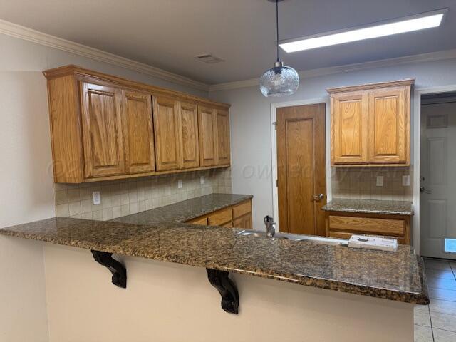 4525 Ida Louise Court Amarillo, TX 79110 - Photo 5 of 14 a bathroom with a granite countertop sink and a mirror
