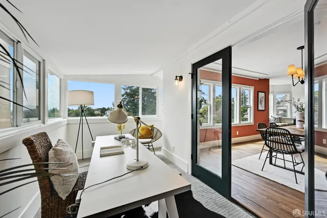 a spacious bedroom with a bed and window
