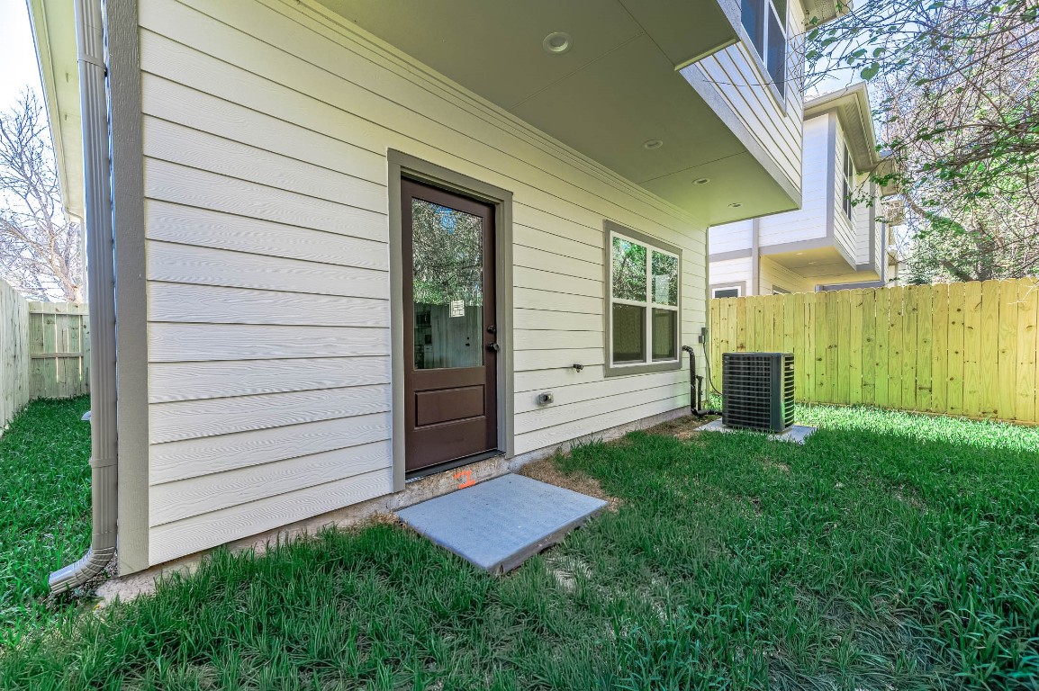 2018 Hampton Street, Unit A B Houston, TX 77088 - Photo 29 of 31 Unit B- Fenced Yard (photo has been modified to show expected spring grass growth)