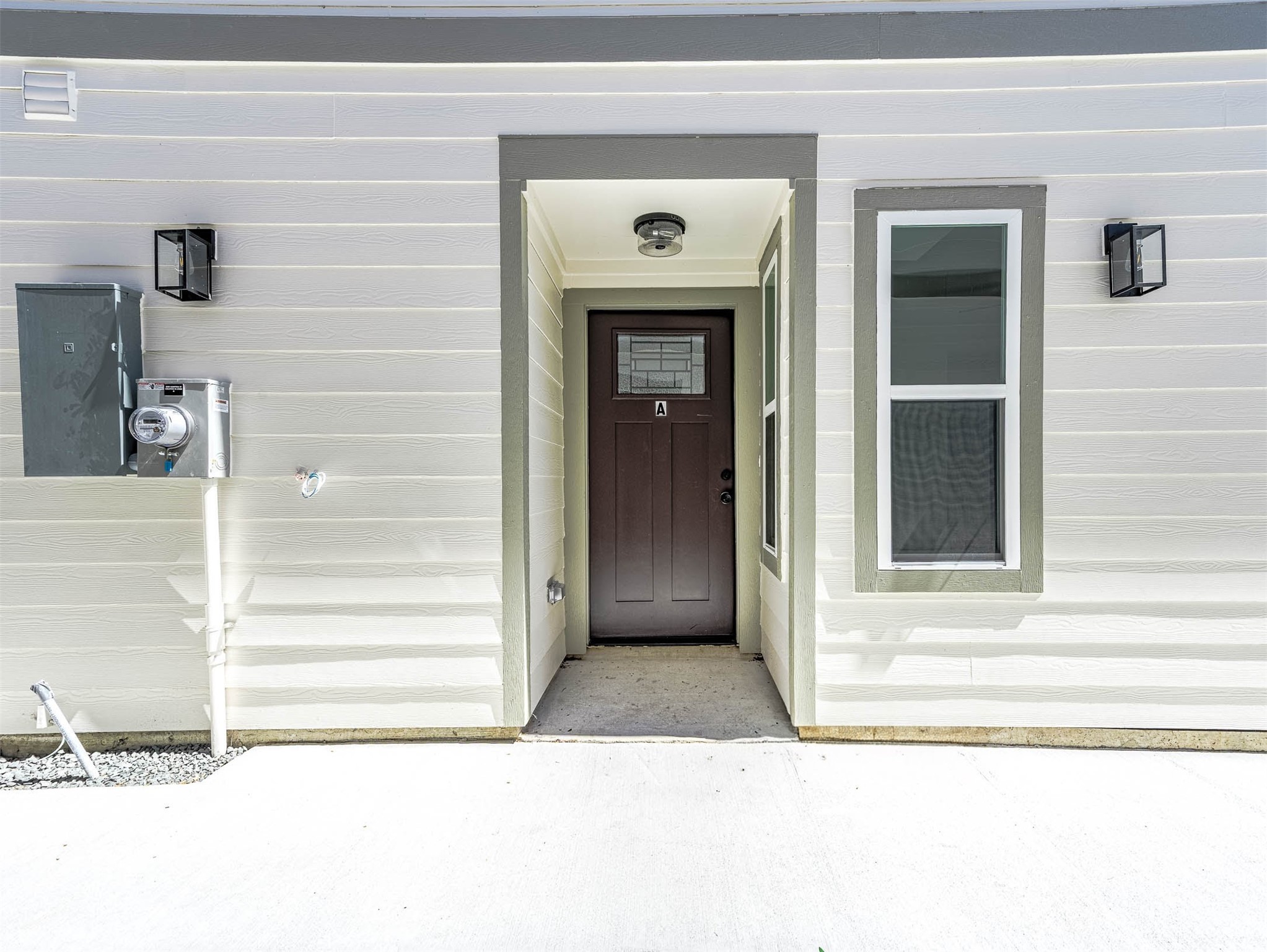 2018 Hampton Street, Unit A B Houston, TX 77088 - Photo 29 of 31 Covered porch and cement board siding — durable curb appeal that holds up