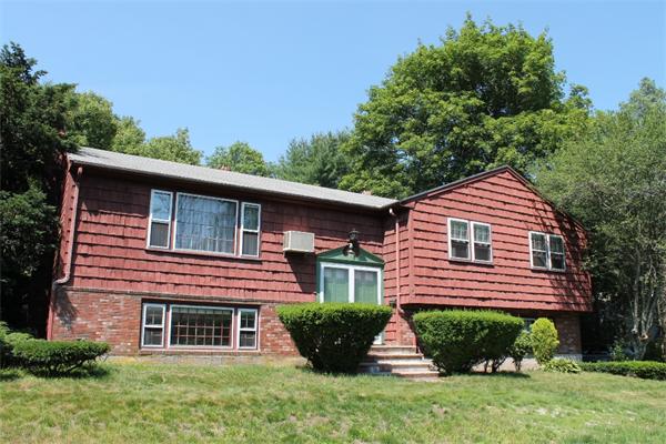 524 Marrett Road Lexington, MA 02421 - Photo 1 of 15 a front view of a house with a yard