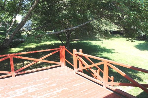 524 Marrett Road Lexington, MA 02421 - Photo 6 of 15 a view of outdoor space with wooden deck and lake view
