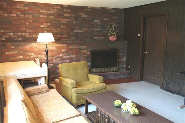 524 Marrett Road Lexington, MA 02421 - Photo 10 of 15 a living room with furniture and a fireplace