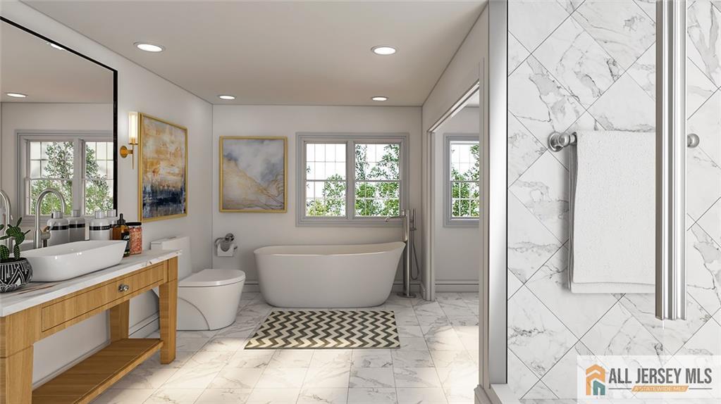 180 River Road Monroe Township, NJ 08831 - Photo 20 of 22 a bathroom with a toilet a sink and tub