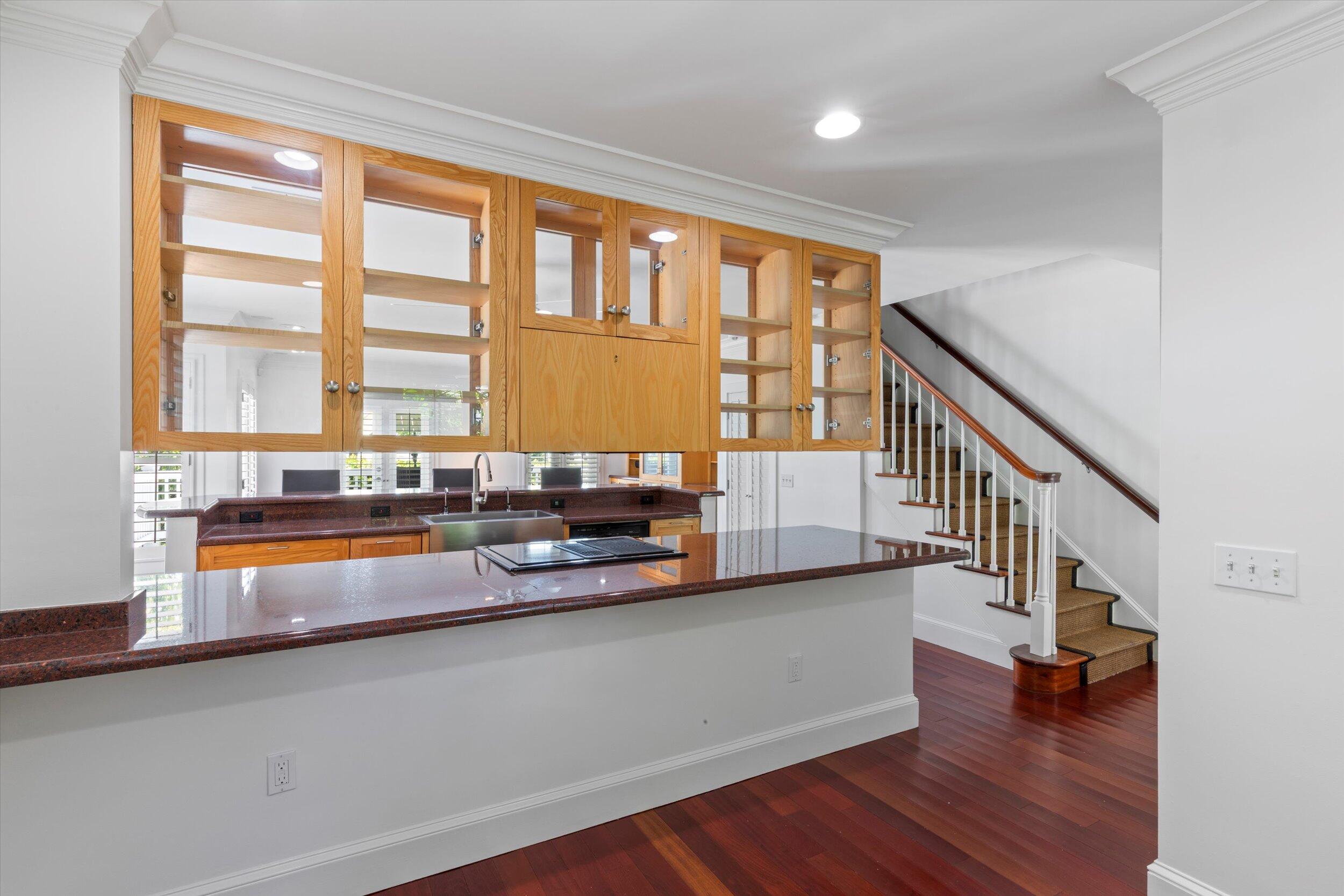 413 Emma Street, Unit A Key West, FL 33040 - Photo 27 of 64 a living room with furniture and floor to ceiling windows