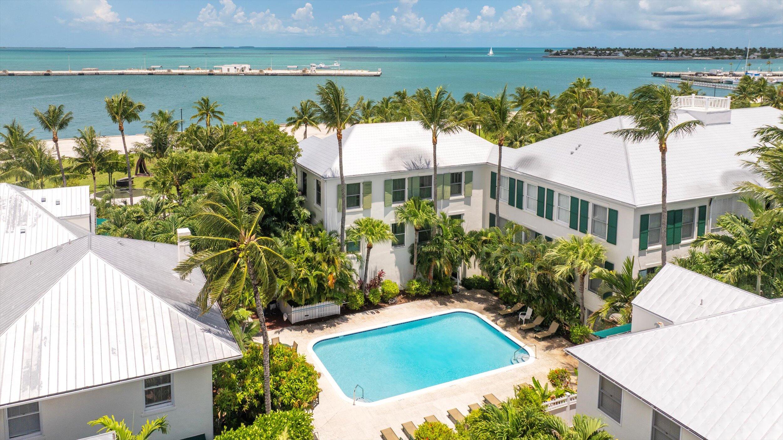 413 Emma Street, Unit A Key West, FL 33040 - Photo 49 of 64 an aerial view of a house with a yard and lake view