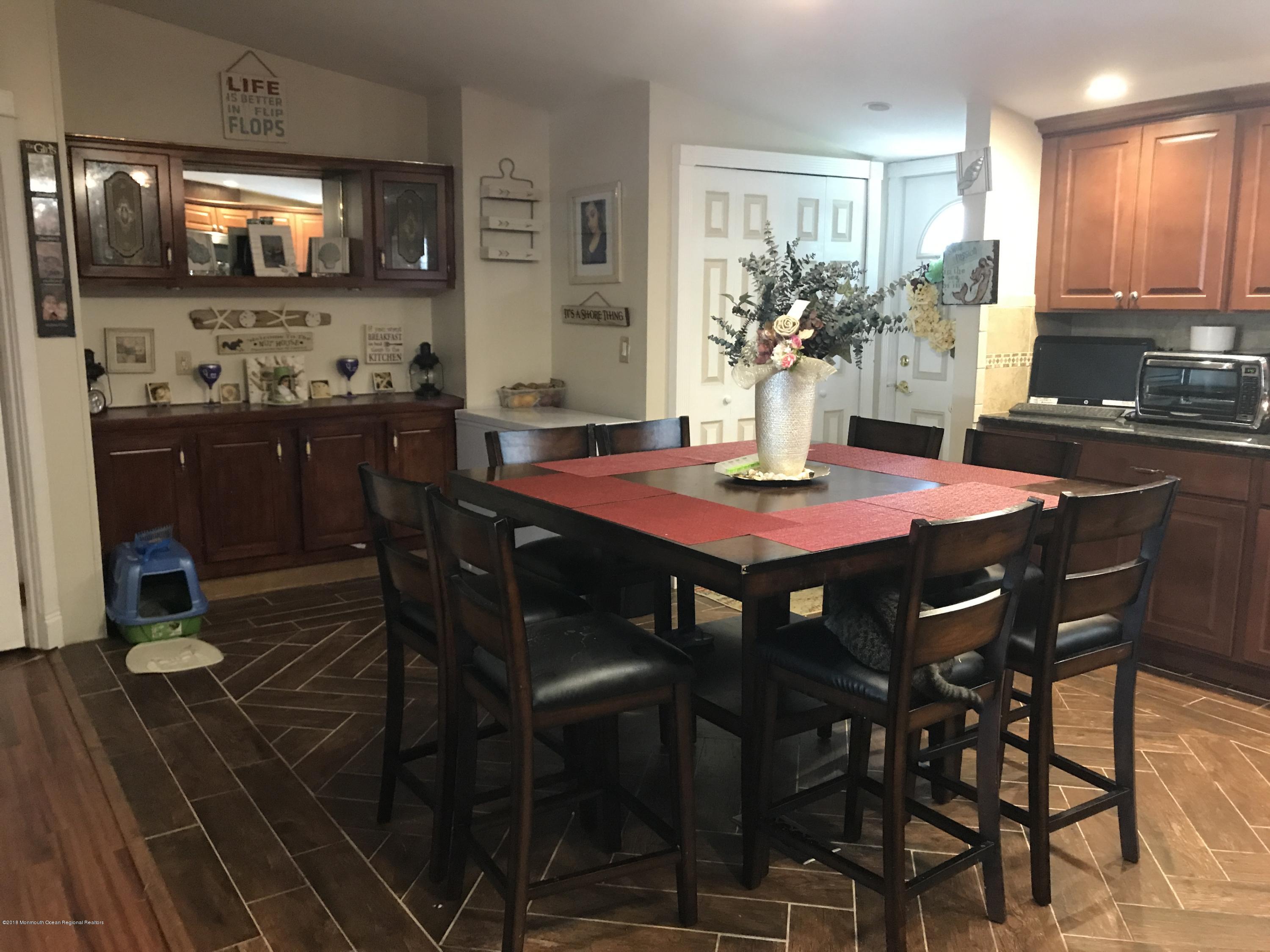 1272 Highway 36, Unit 39 Hazlet, NJ 07730 - Photo 6 of 13 a dining room with furniture and window