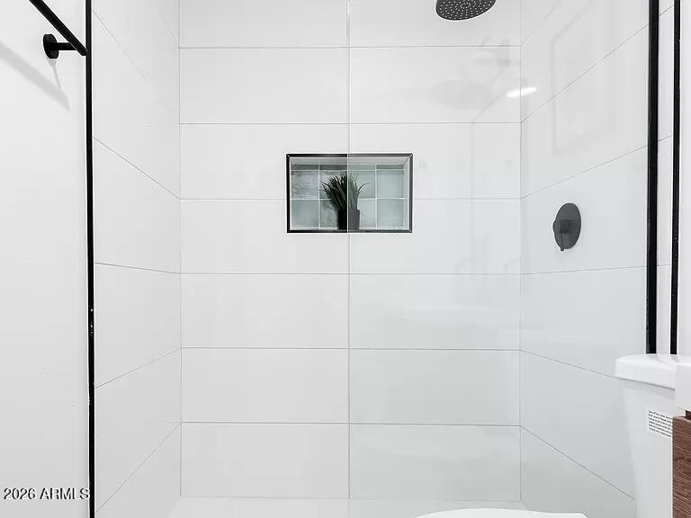 2915 West Griswold Road Phoenix, AZ 85051 - Photo 12 of 17 a bathroom with a shower