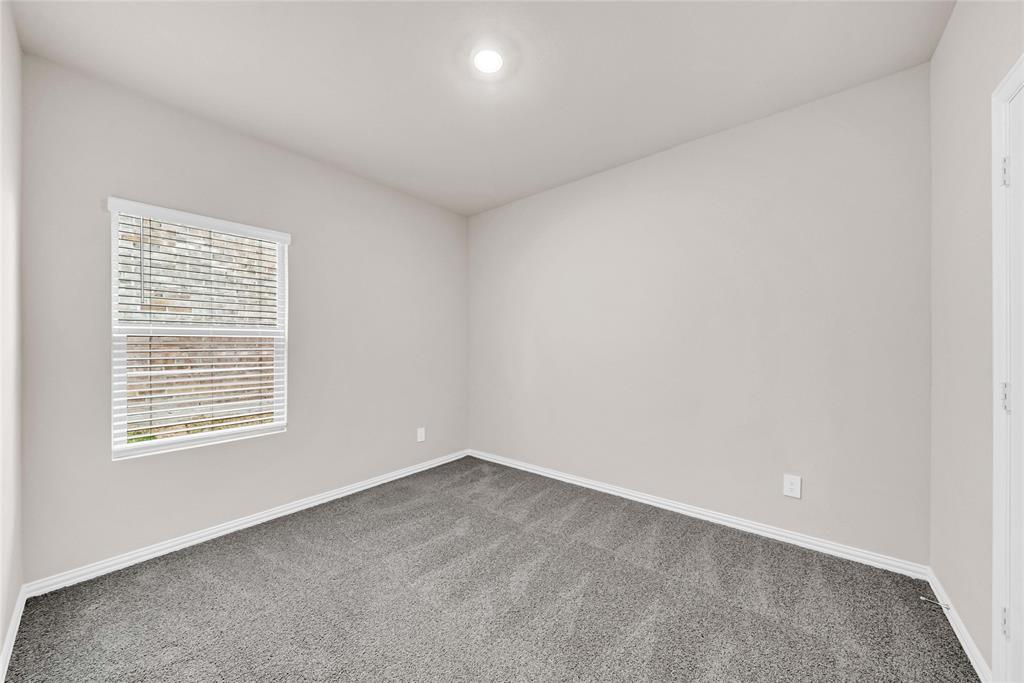 417 Martell Road Lowry Crossing, TX 75069 - Photo 19 of 29 an empty room with a window