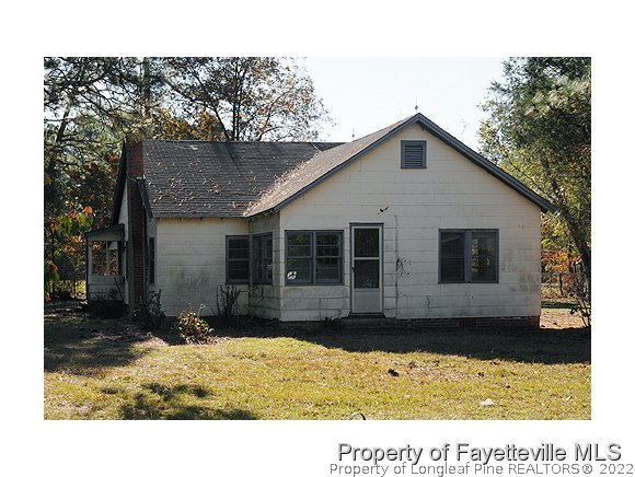 1348 Bainbridge Road Stedman, NC 28391 - Photo 1 of 4 a house view with a backyard space