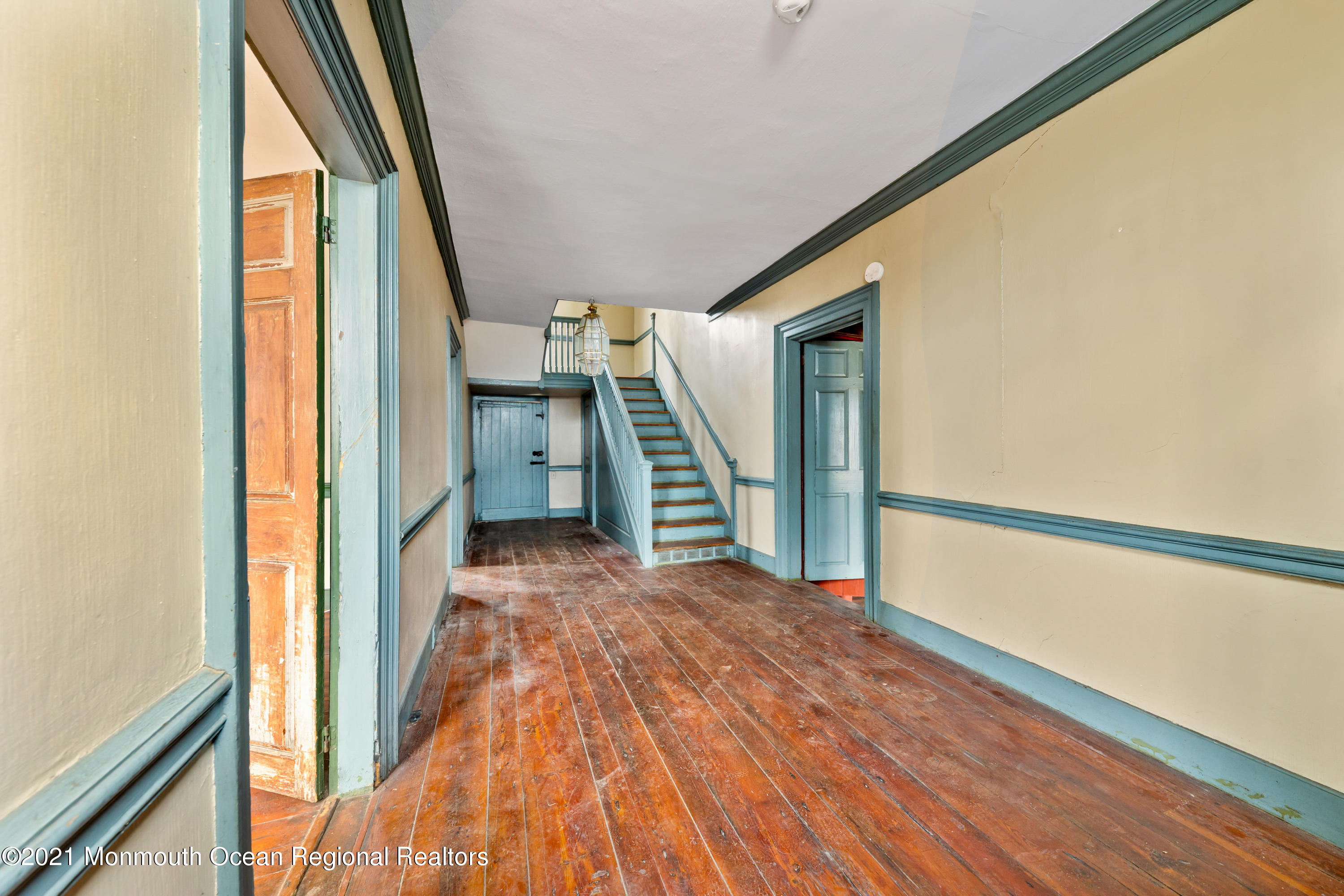 501 Province Line Road Allentown, NJ 08501 - Photo 1 of 24 a view of a hallway with wooden floor and stairs
