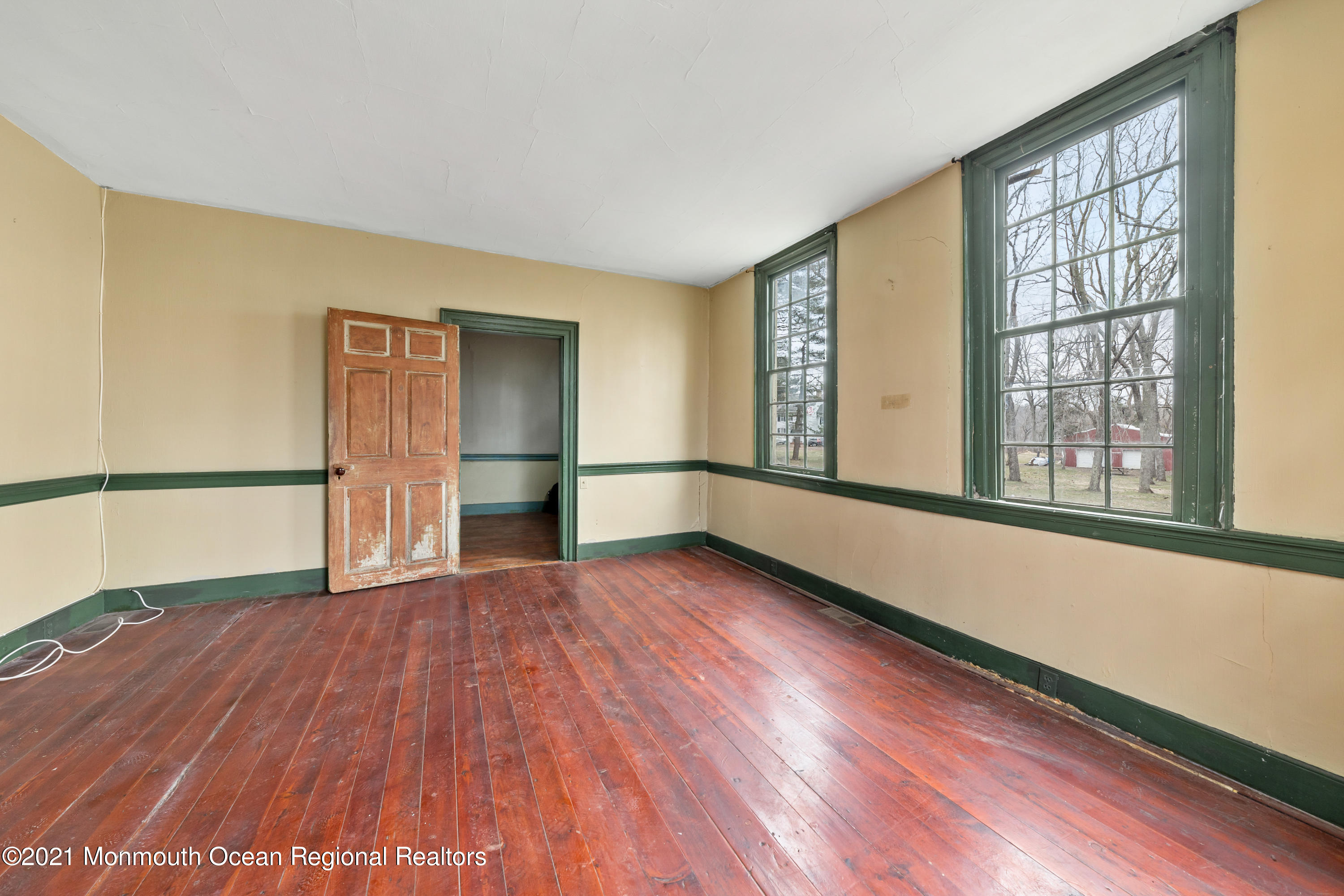 501 Province Line Road Allentown, NJ 08501 - Photo 5 of 24 wooden floor in an empty room with a window