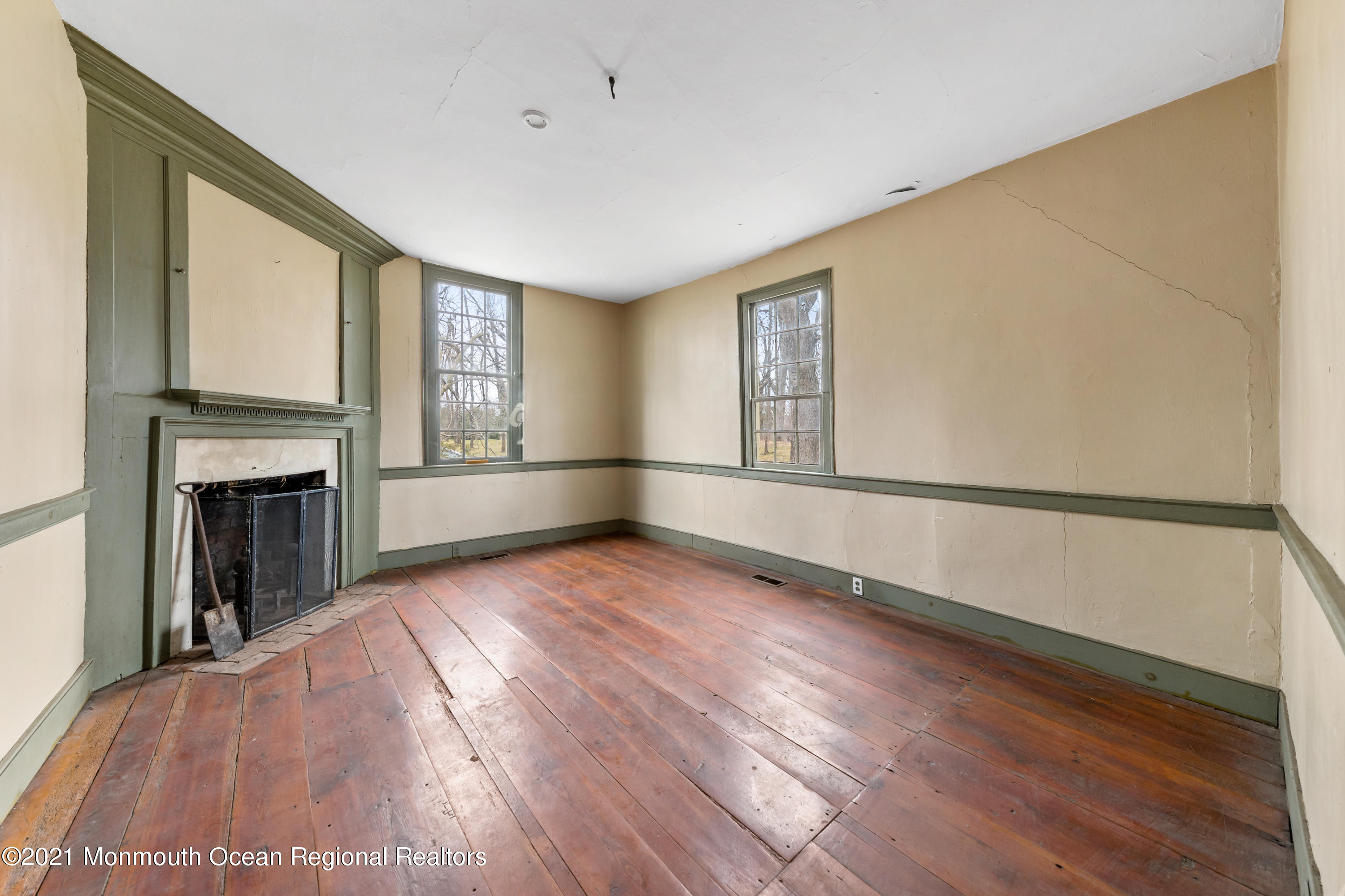 501 Province Line Road Allentown, NJ 08501 - Photo 6 of 24 a view of an empty room with wooden floor and a window