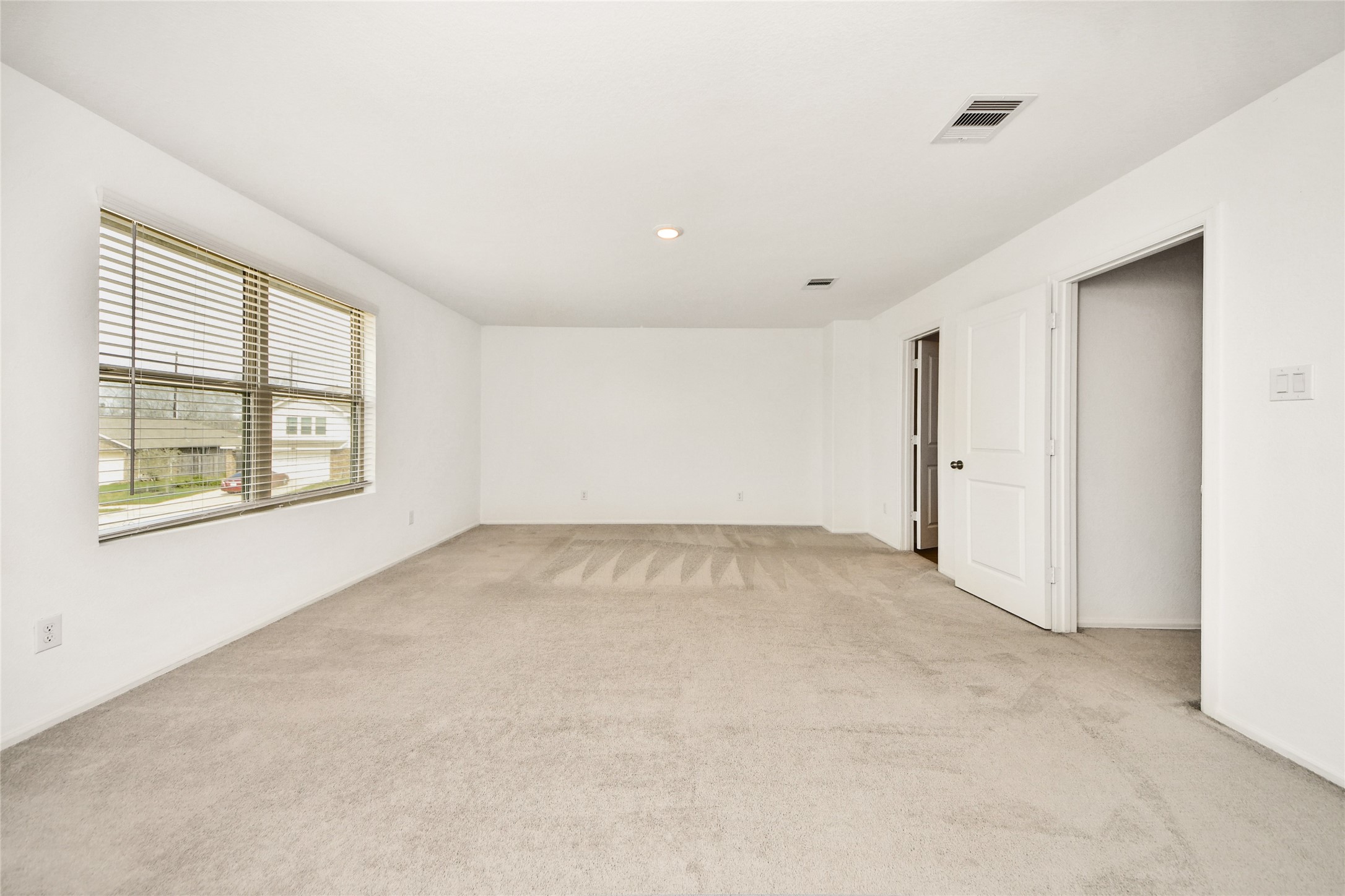 5011 Stratton Lane Rosharon, TX 77583 - Photo 17 of 38 Light-filled primary suite with plenty of room to unwind.