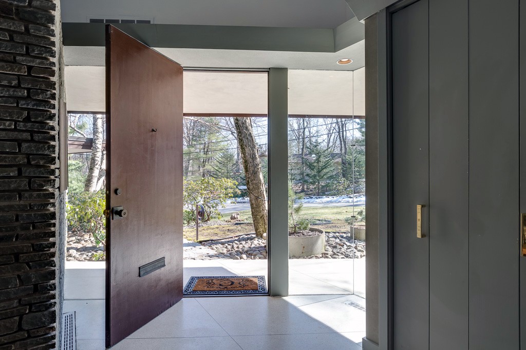 64 Oak Hill Road Worcester, MA 01609 - Photo 3 of 23 a view of an empty room with wooden floor and a window